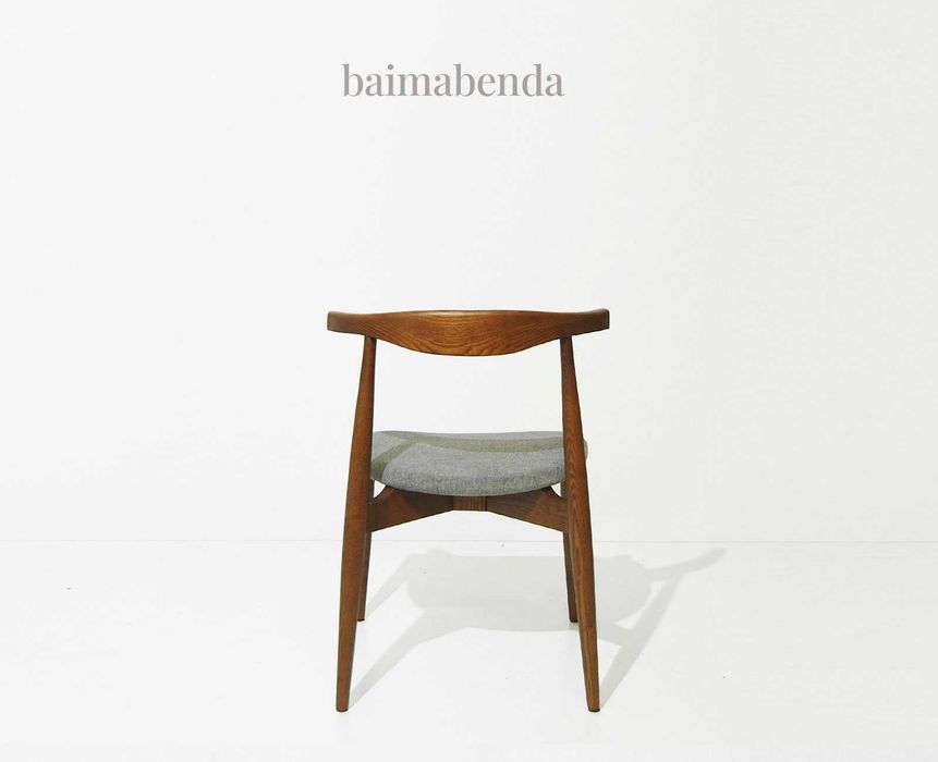 Cadeira estilo nórdico inspirada no design de Hans Wegner