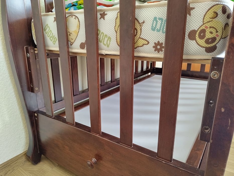 Дитяче ліжечко маятник