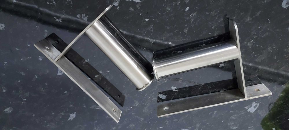 Suporte de parede para rolos