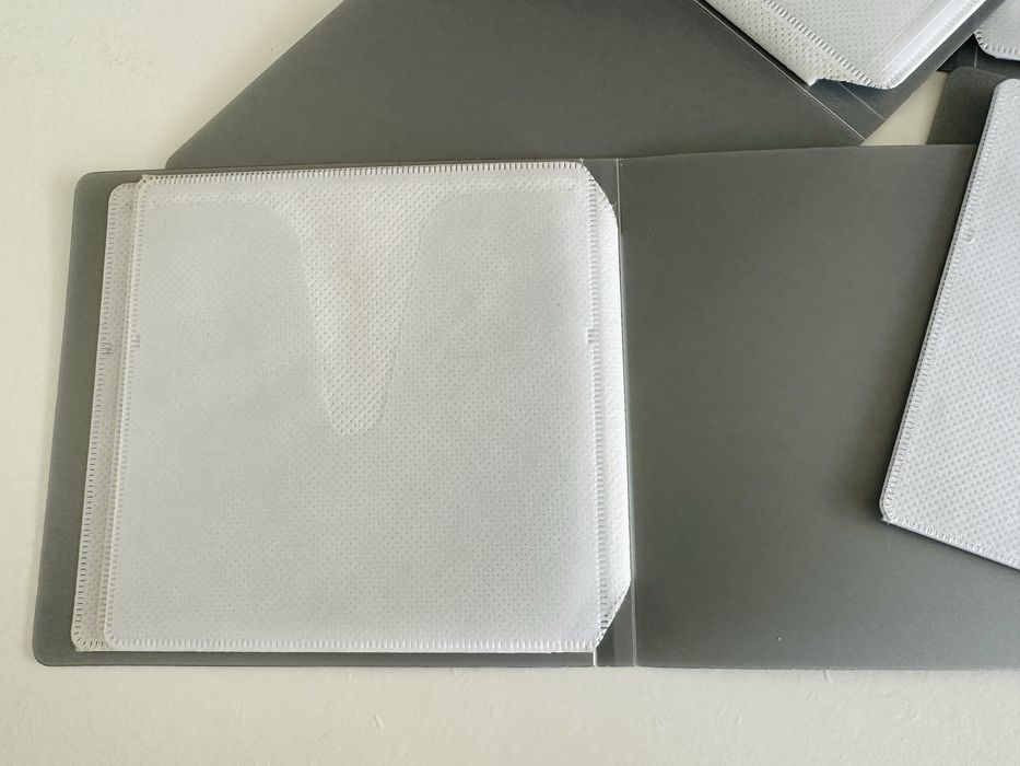 4 porta CDs / DVDs para armazenamento/ transporte de 32 unidades no total