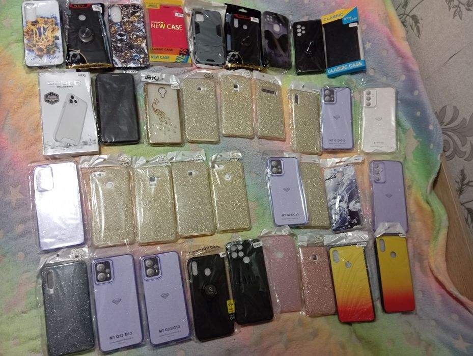 Мега лот чехлов -книжка и бамперов на разные модели телефона.