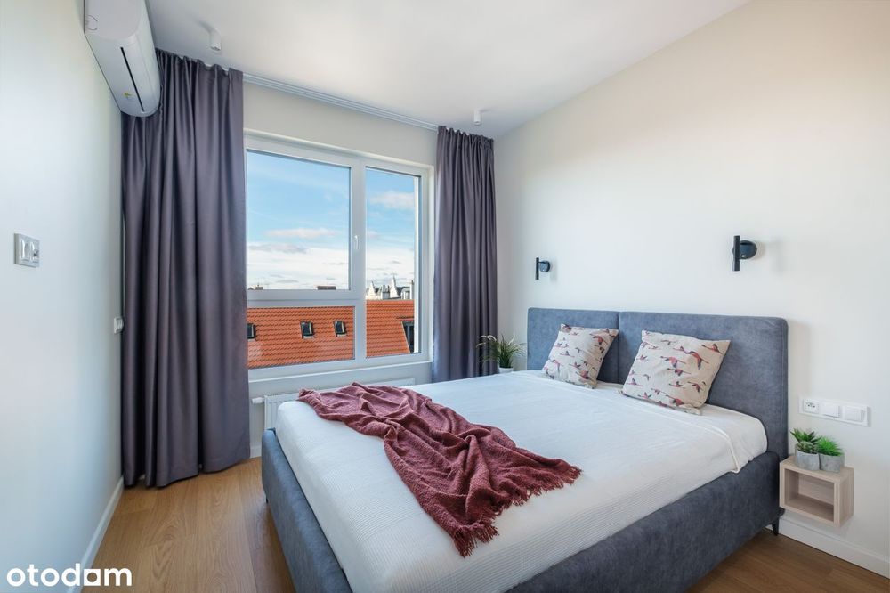 z klimą widok na Jeżyce z parkingiem i komórką