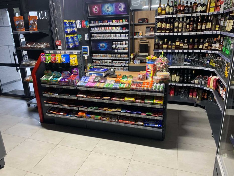 Торгове обладнання для магазинів. Стелажі. Каси прилавки. Кондитерські стелажі. Хлібні кошики