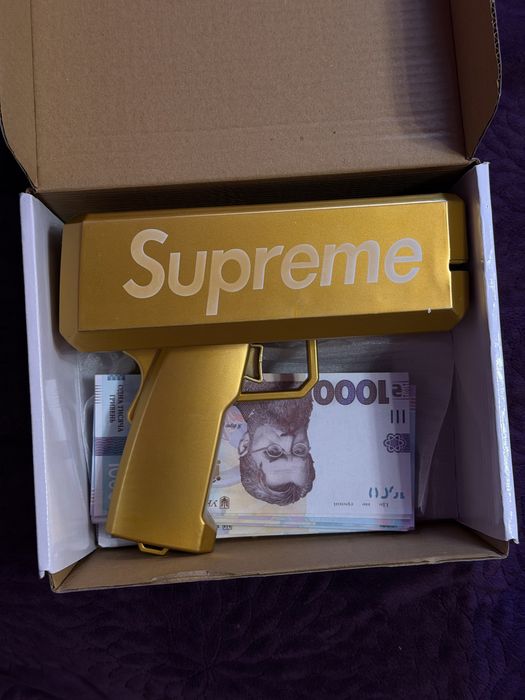 Пістолет для грошей SUPREME Money Gun (золотистий) Aurora
