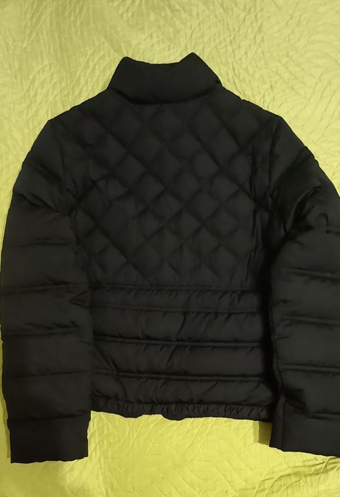 Пухова куртка жіноча