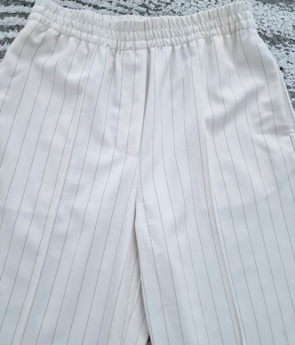 Spodnie szerokie,ecru,paski"H&M".