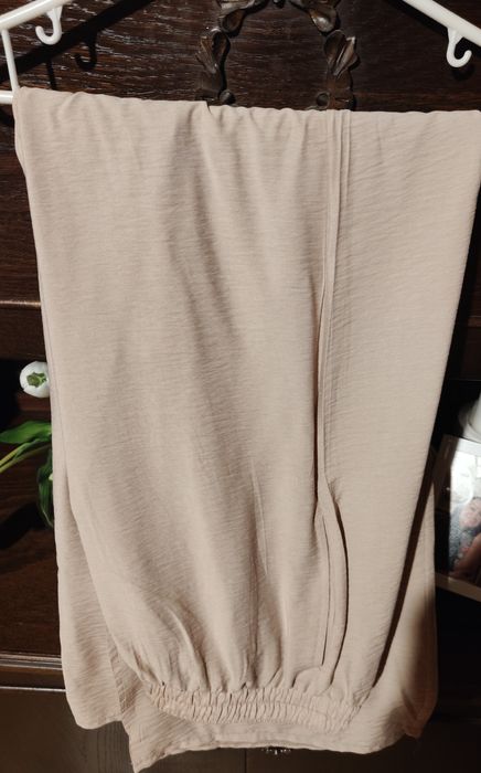 Beżowe letnie spodnie z szerokimi nogawkami 40/42 L/XL