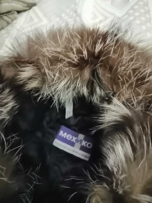 Мехова шапка з вушками жіноча