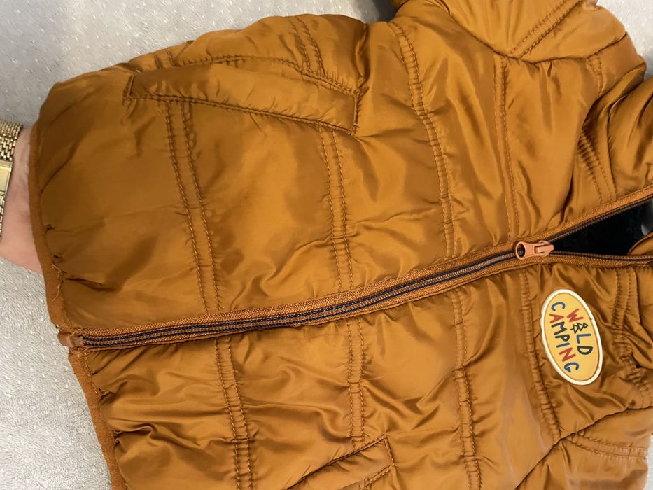 Brazowa kurtka zimowa chlopieca 80