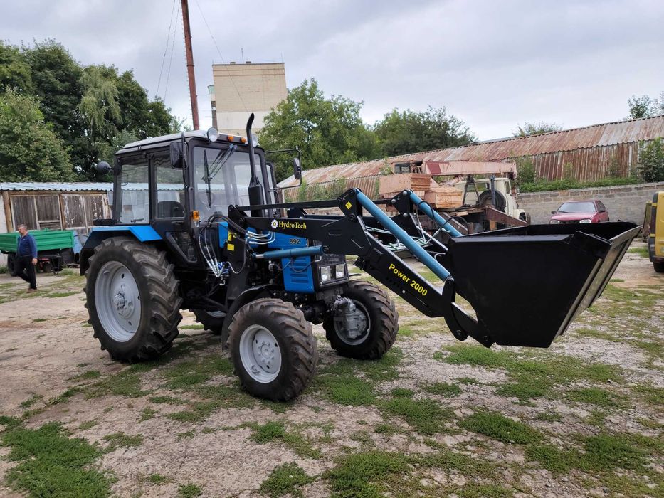 Быстросйомный фронтальный погрузчик кун Юмз