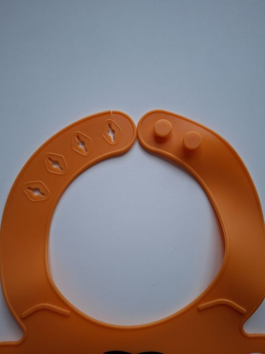 Zestaw 2 śliniaków – silikonowy tygrysek + materiałowy Canpol