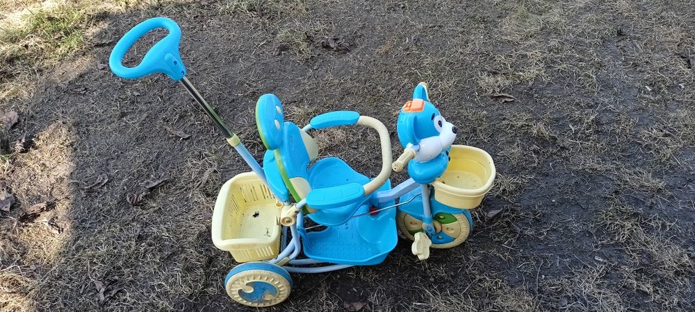 Niebieski rowerek trójkołowy z prowadnikiem – Pchacz dla dziecka