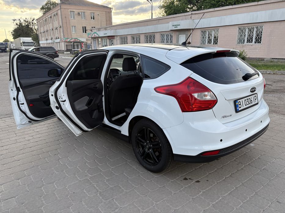 Ford Focus 2012 VIN WF0KXXGCBKCC21674 фото оголошення 3 з 8