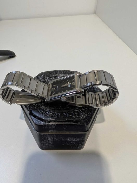 Часы Casio MTP-1235, чёрный циферблат, металлический браслет