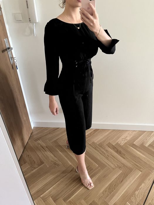 Czarny kombinezon reserved