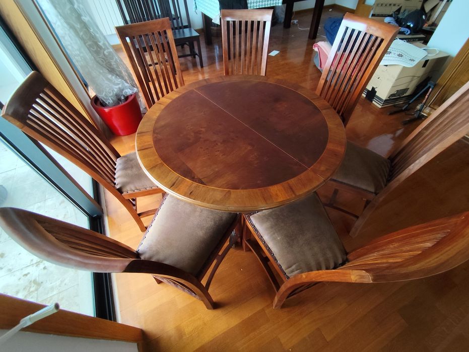 Mesa de jantar em raíz de nogueira com jogo de 7 cadeiras