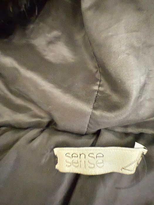 Casaco de pelo preto