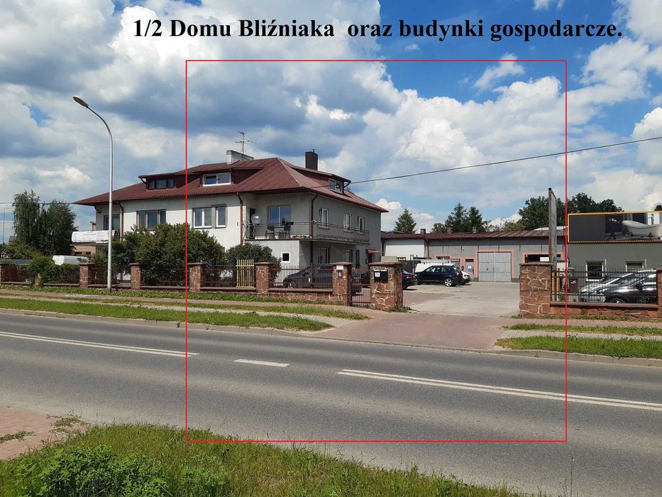 Dom wielorodzinny -1/2 dużego bliźniaka i zabudowania przemysłowe