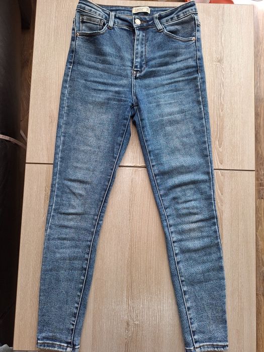 Damskie dzinsy skinny 38