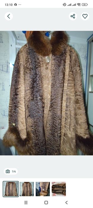 Шуба- коричневий  каракуль, опушка-песец.Ширина плечей- 45см., ширина