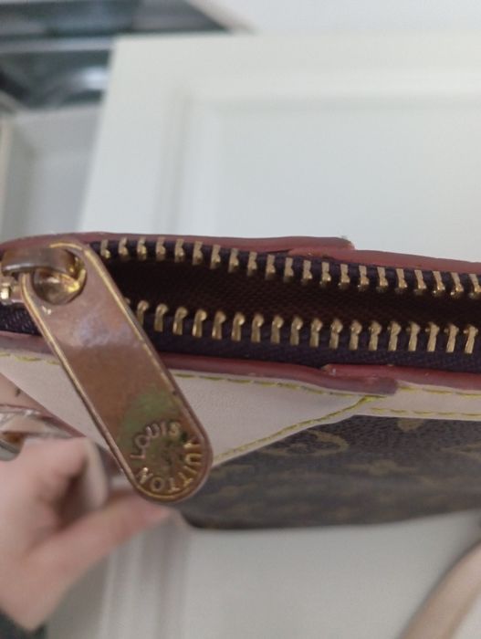 Torebkę Louis Vuitton Odéon PM
