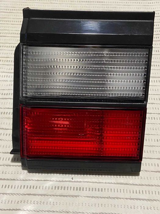 Фара VW passat правий зад кришку багажника  HELLF нова