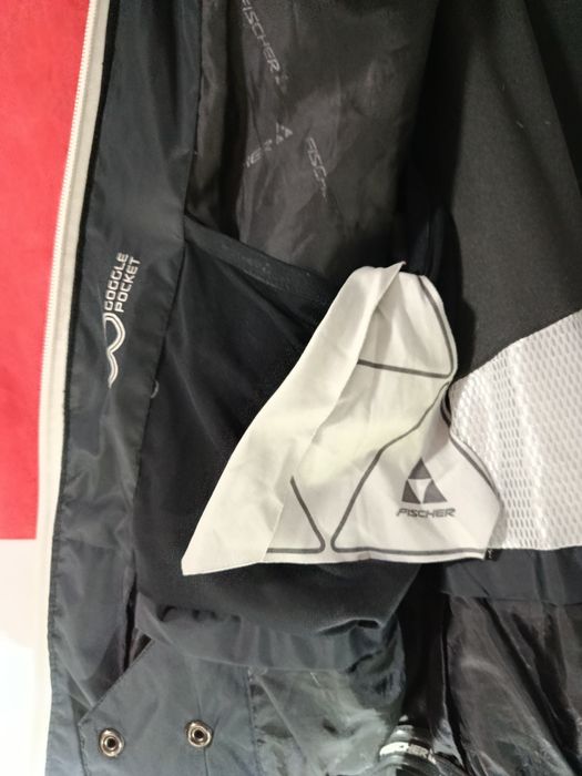 Мужской пуховик Fisher Carbon ориг.р..M-L,рюкзак новый Германия