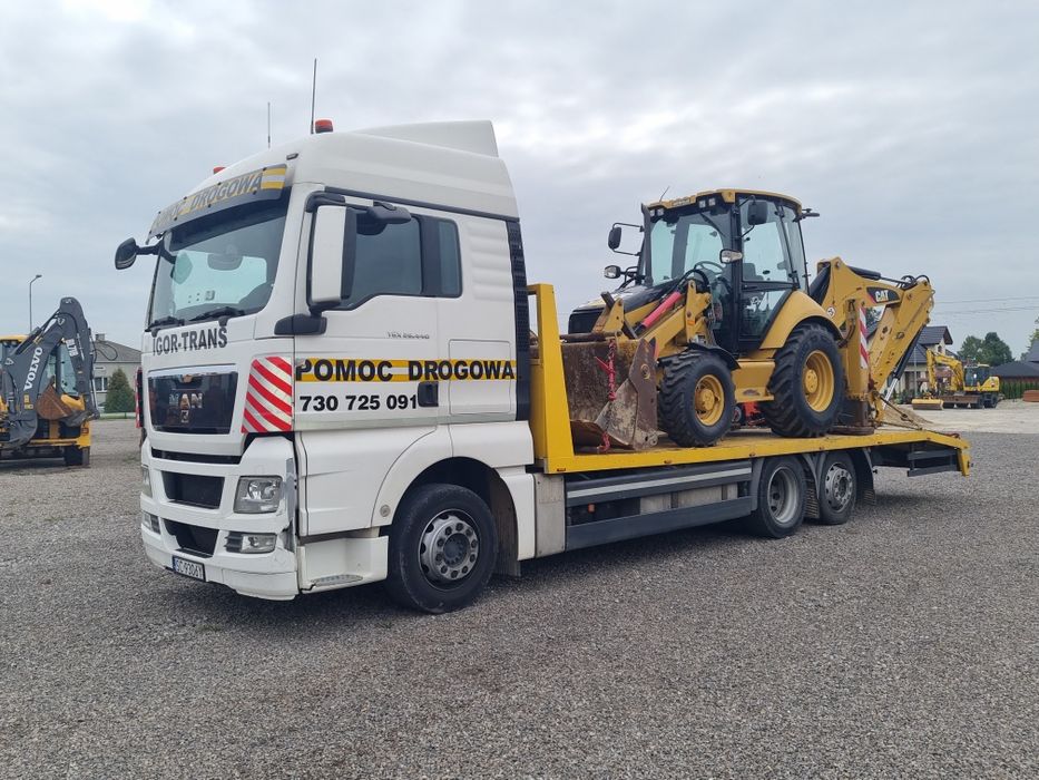 Pomoc drogowa laweta Transport  maszyn budowlanych , ciągników , kopar