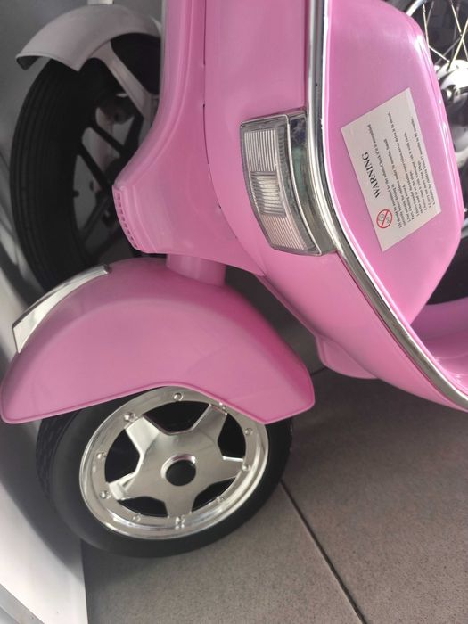 Vespa infantil cor de rosa