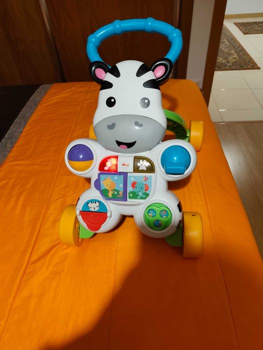 Andador fisher price zebra