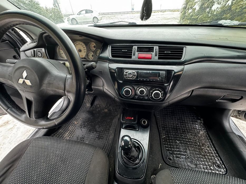 Mitsubishi Lancer 1,6 газ/бензин