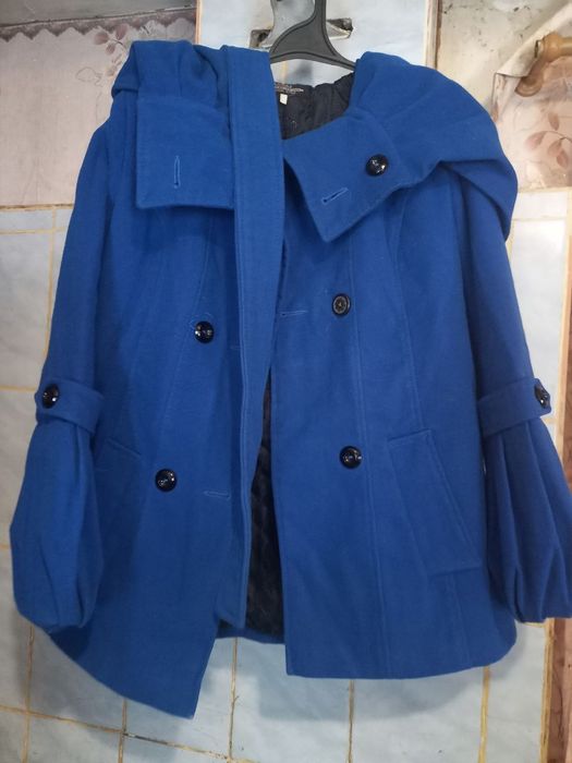 Пальто синього кольору