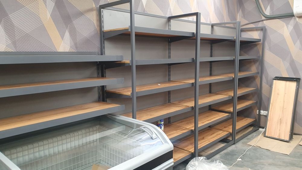 Торгові стелажі та торговельне обладнання с торговими горками