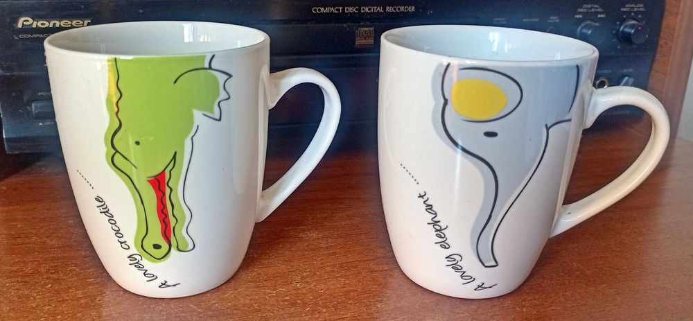 Чашка с животными.