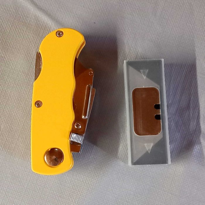 Cúter plegable acero. Inoxidable