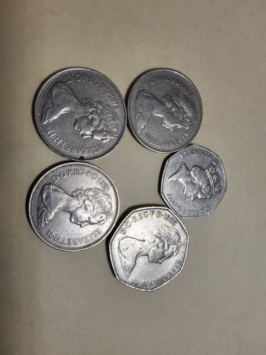 5 moedas new pence canadiano