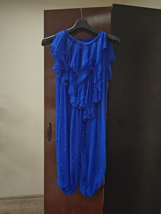 Різноманітні костюми для східних та бальних танців