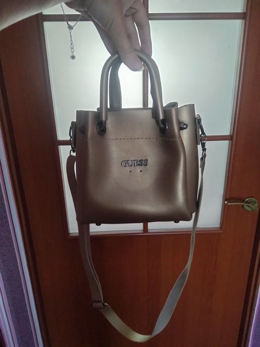 Небольшая сумка с длиной ручкой