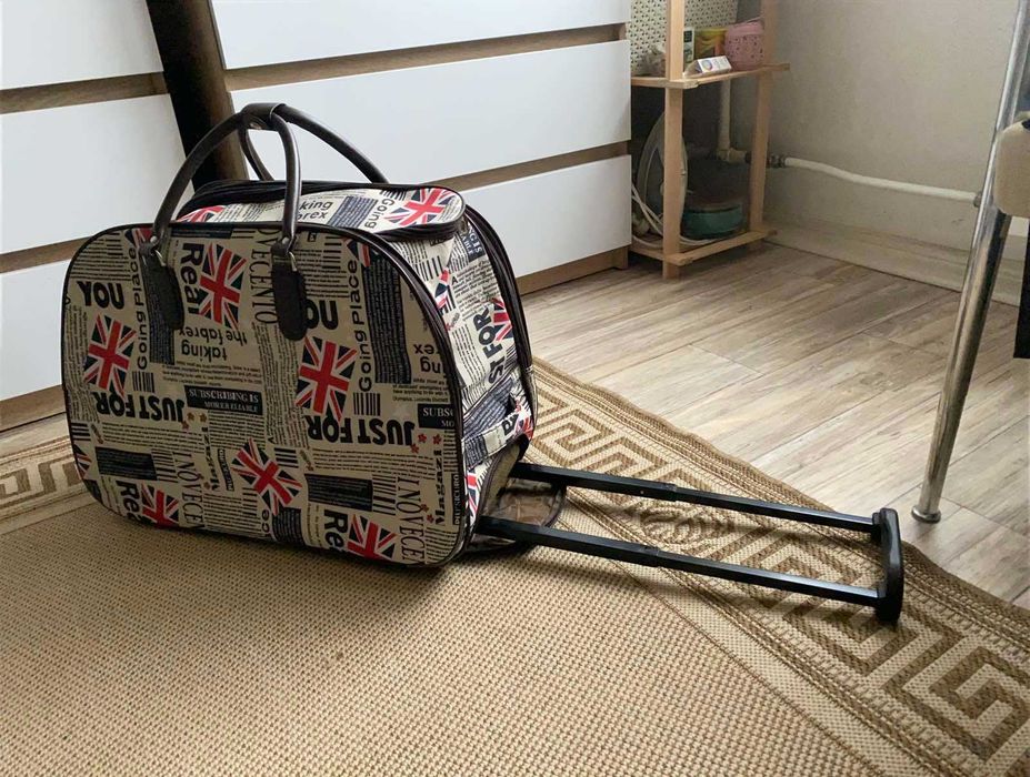 Дорожня сумка на колісах