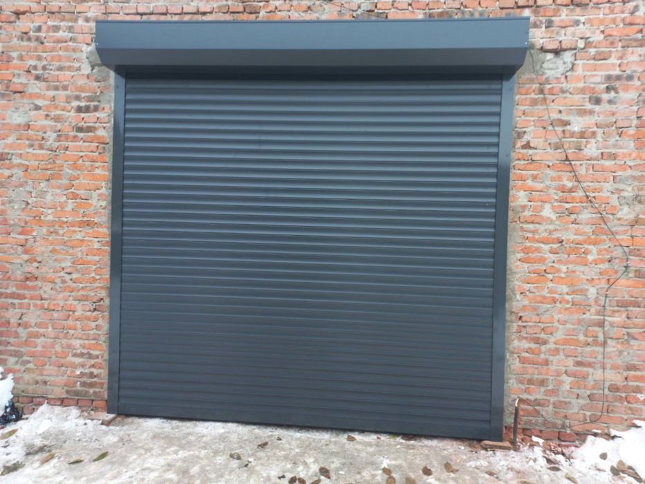 Секційні автоматичні ворота / ролети