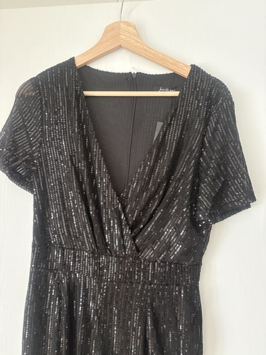 Piękny cekinowy czarny kombinezon M/L