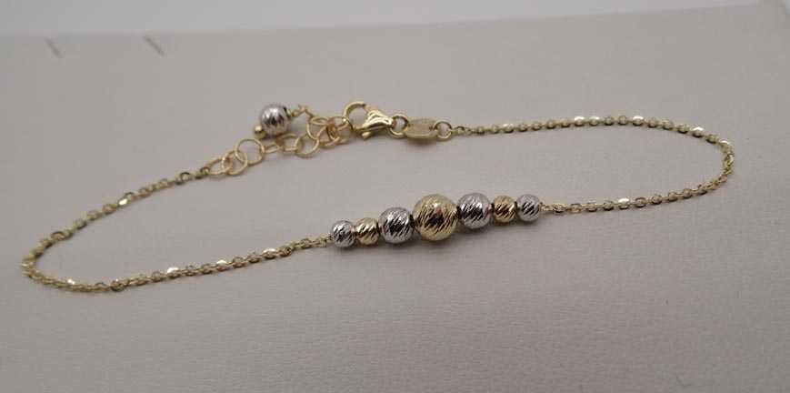 Złota bransoletka ankier dwukolorowe diamentowane kulki 16 - 19 cm.