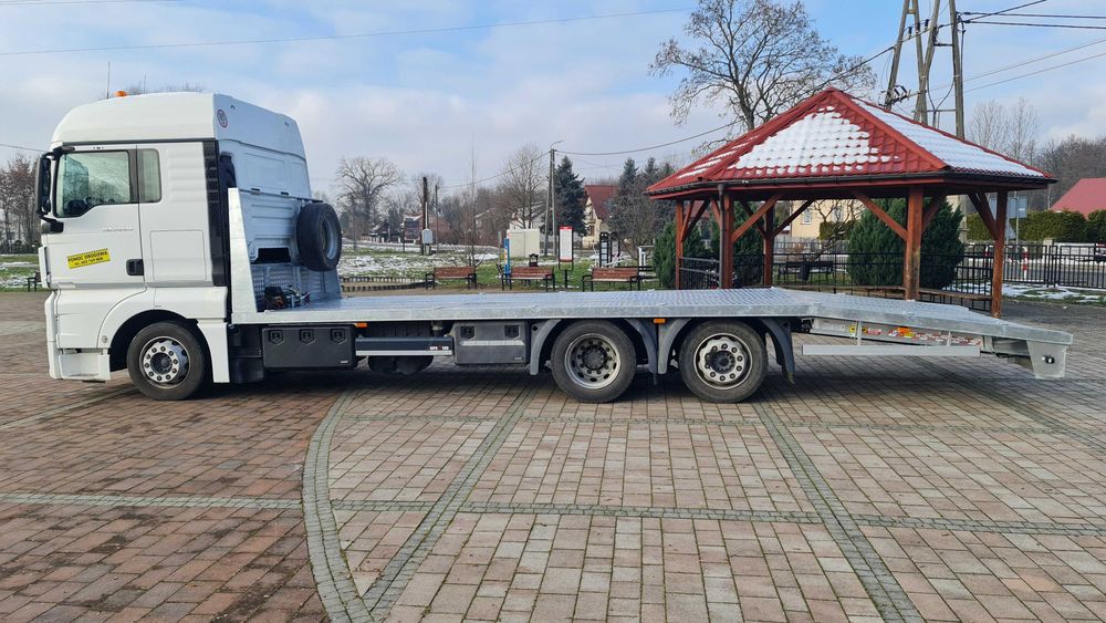 Najazd platforma ciężarowe trzyośka zabudowa laweta MAN TGM Hydraulika
