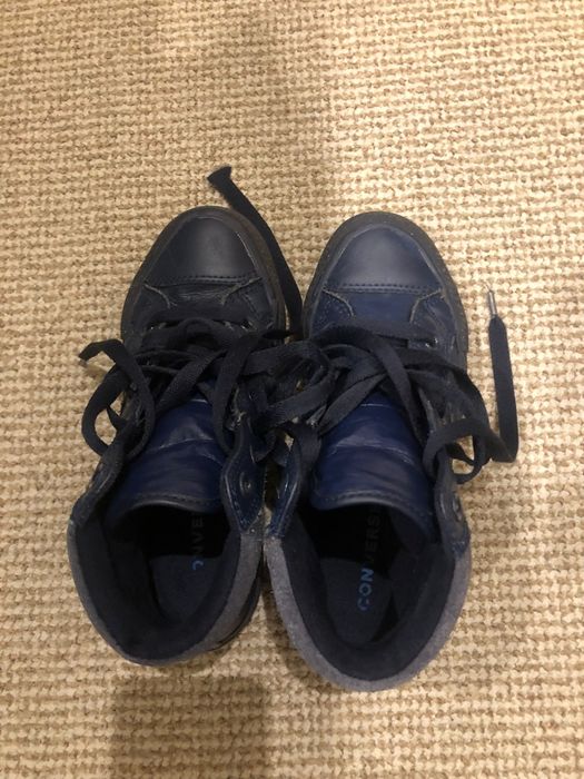 Converse all star em pele