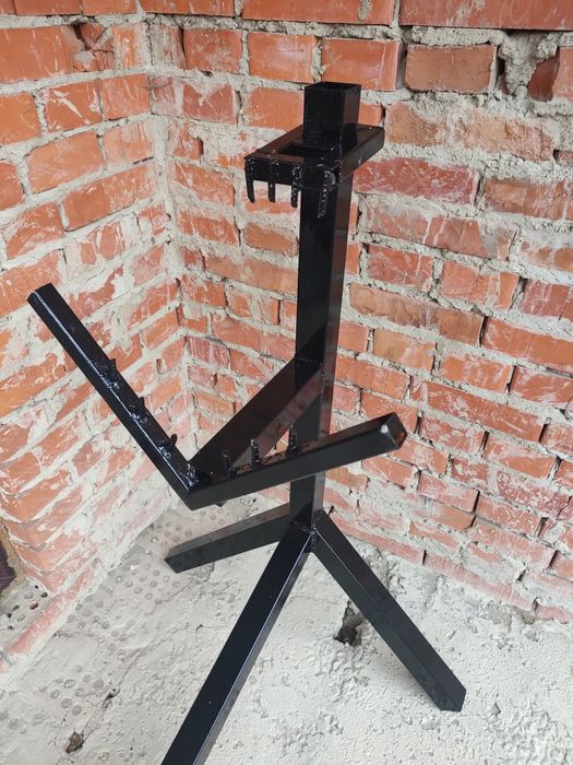 Тримач для порізки дров.