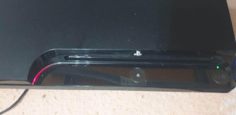 PS3 Slim + 10 jogos