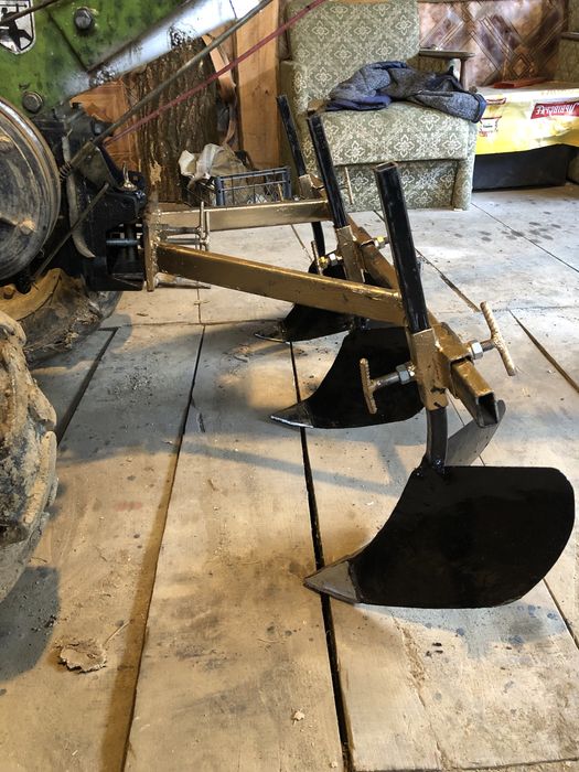 Плуги (марка) до мотоблока