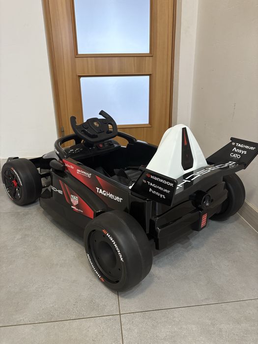 Bolid Formuły F1 na akumulator 12V Porsche auto dla dzieci pilot EVA