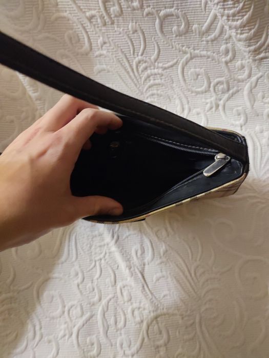 Vendo mala pequena de senhora