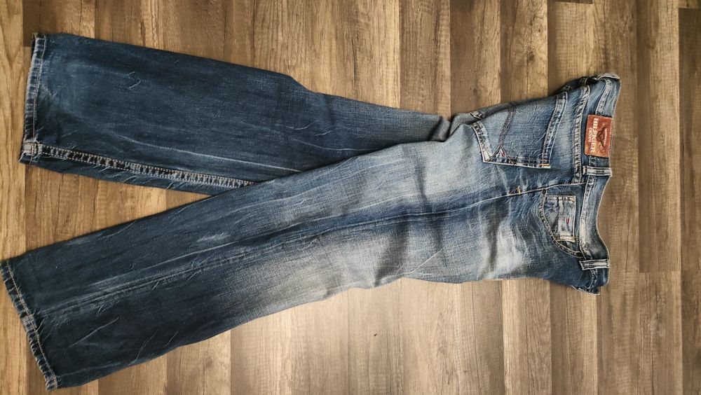 świetne jeansowe spodnie TOMMY HILFIGER 30/32